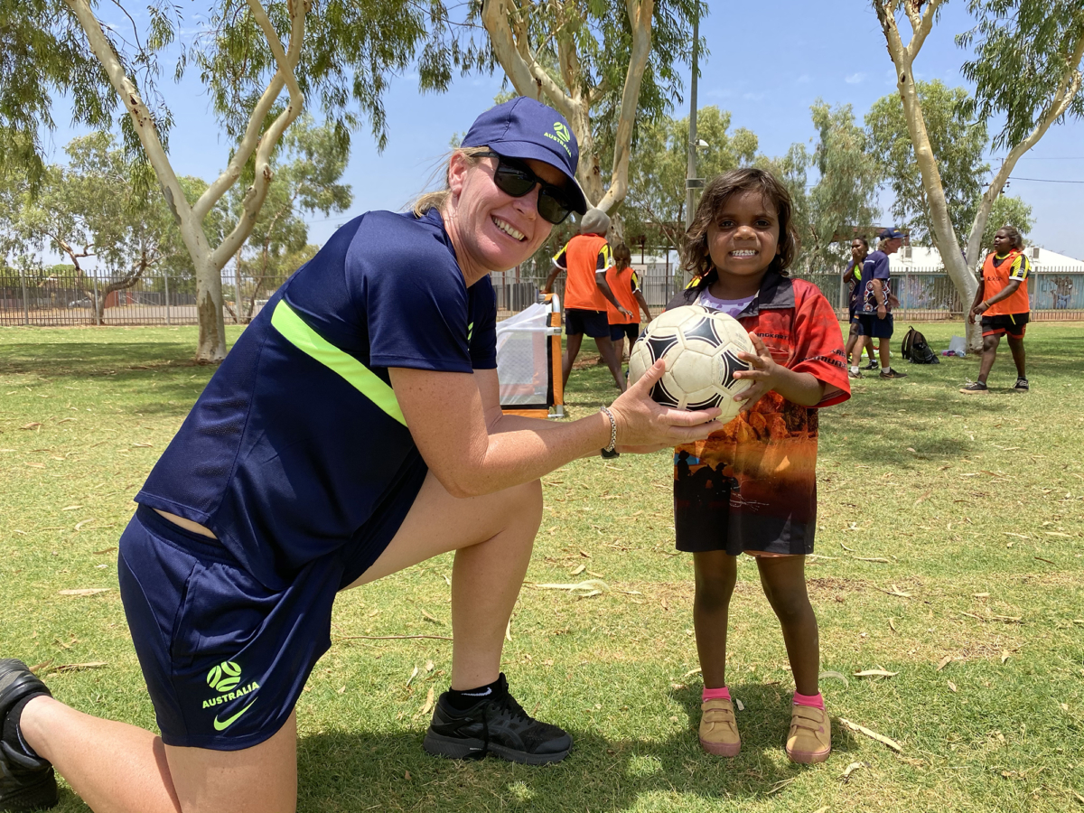 Mel Andreatta and JMF player at Tennant Creek