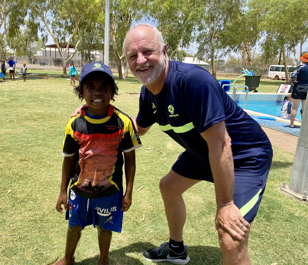 Graham Arnold and JMF player at Tennant Creek 
